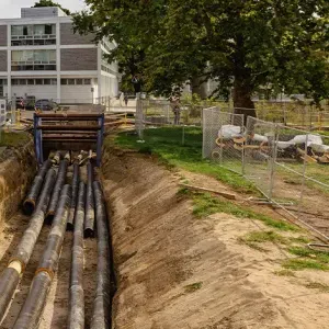 Newly laid distribution pipes next to the Davis Center